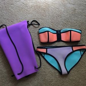 Triangl Swimsuit with bag included
